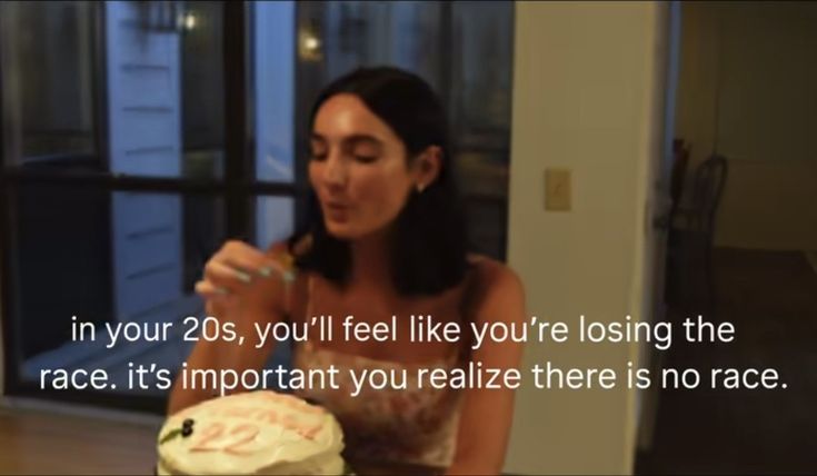 A screenshot from a TV show depicts a young woman in front of a birthday cake. It's captioned "In your 20s, you'll feel like you're losing the race. It's important you realize there is no race."